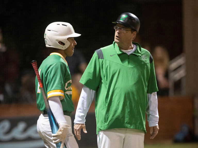 Pensacola Catholic head baseball coach Richard LaBounty (right) talks to a player during the Crusaders' win over Central on Wednesday, March 27, 2024. LaBounty recently won his 750th career game. Photo by Tony Giberson/tgiberson@gannett.com / USA TODAY NETWORK