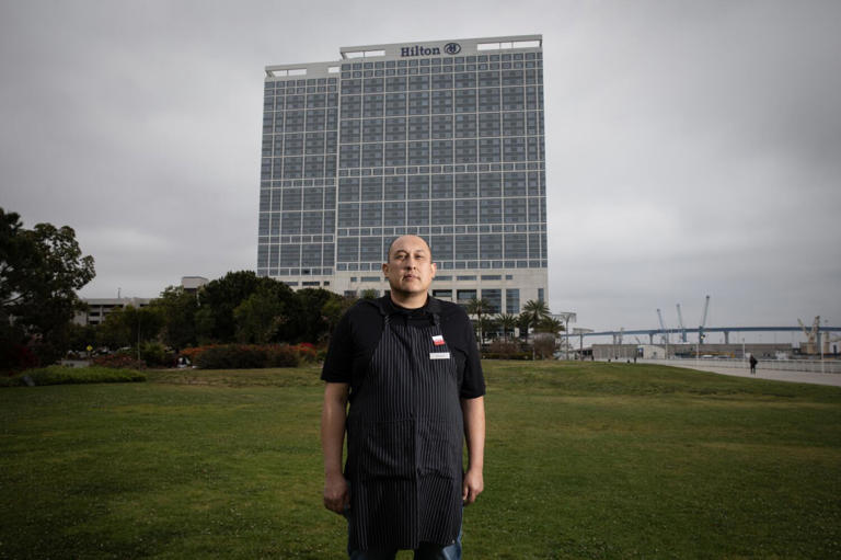 San Diego, California - April 30: Christian Carbajal, an employee at the Hilton San Diego Bayfront Hotel, will rally with other hotel works on International Worker's Day in San Diego, California.