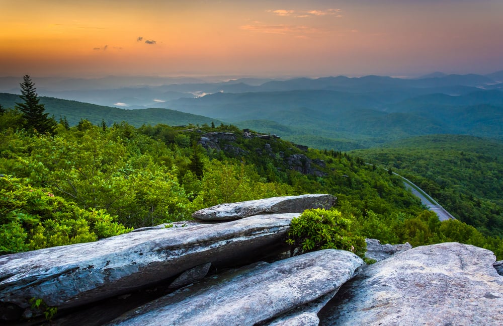 <p>The Blue Ridge Parkway, a route passing through Virginia and North Carolina, provides vistas of the Blue Ridge Mountains and the surrounding landscape. Travelers can make pit stops at overlooks and hike trails like the Humpback Rocks trail. The parkway is teeming with wildlife, such as bears, deer, and birds of prey.</p>