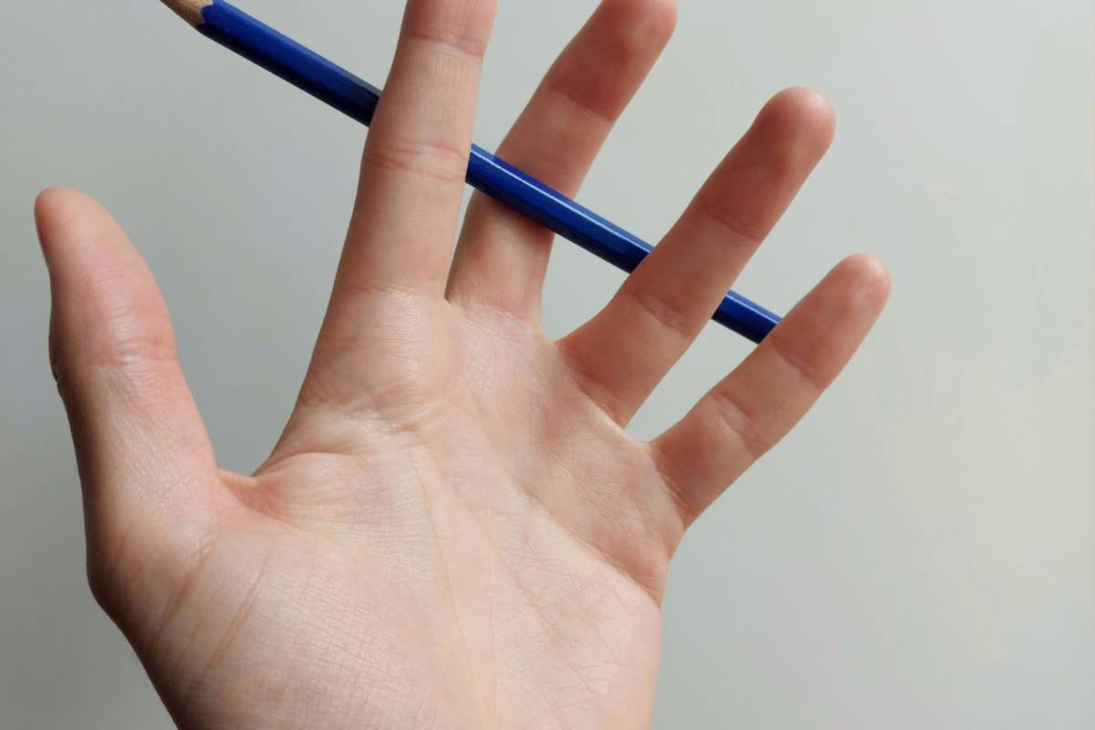 <p>Your starting point is often the pencil grasp. A pencil grasp is a functional grasp.</p> <p>Proper pencil grasp is important for a child’s fine motor skills and handwriting abilities. </p> <p>Here are some strategies to help a child develop a functional and efficient pencil grasp:</p> <ol> <li><strong>Provide the Right Tools</strong>: <ul> <li>Use age-appropriate writing utensils like pencils, crayons, and markers. Thicker or triangular-shaped pencils can be easier to grip for young children.</li> </ul> </li> <li><strong>Demonstrate the Correct Grasp</strong>: <ul> <li>Show the child how to hold a writing tool correctly. The preferred grasp for most children is the dynamic tripod grasp, where the pencil is held between the thumb and the first two fingers, with the pinky and ring fingers curled into the palm.</li> </ul> </li> <li><strong>Encourage Fine Motor Activities</strong>: <ul> <li>Engage in activities that promote fine motor skills, such as playing with building blocks, puzzles, or clay. These activities help strengthen the muscles needed for a proper pencil grasp.</li> </ul> </li> <li><strong>Practice Hand Strengthening Exercises</strong>: <ul> <li>Activities like squeezing <a class="wpil_keyword_link" href="https://adayinourshoes.com/homemade-playdough-recipes-uses/" rel="noopener" title="playdough">playdough</a>, using clothespins, or doing finger exercises can help build hand strength.</li> </ul> </li> <li><strong>Pre-Writing Activities</strong>: <ul> <li>Engage in pre-writing activities like drawing shapes, lines, and patterns, which help children practice hand-eye coordination and pencil control.</li> </ul> </li> <li><strong>Use Guided Tracing Worksheets</strong>: <ul> <li>Provide guided tracing worksheets allowing the child to trace over lines and shapes to develop control and precision in hand movements.</li> </ul> </li> <li><strong>Provide a Slant Board</strong>: <ul> <li>A slant board can help children maintain a more comfortable and functional wrist position while writing or drawing.</li> </ul> </li> <li><strong>Encourage a Relaxed Grip</strong>: <ul> <li>Ensure the child’s grip is not too tight. A relaxed hand and fingers allow for better control and movement.</li> </ul> </li> <li><strong>Offer Sensory Activities</strong>: <ul> <li>Activities involving textures, such as finger painting, can improve sensory perception and strength.</li> </ul> </li> <li><strong>Allow for Individual Variation</strong>: <ul> <li>It’s important to note that while the tripod grasp is typical, some children may develop different but functional grips. The key is to focus on a grip that allows for control and legibility without causing strain or discomfort.</li> </ul> </li> <li><strong>Praise and Positive Reinforcement</strong>: <ul> <li>Encourage and praise the child’s efforts and progress. Positive reinforcement can boost their confidence and motivation.</li> </ul> </li> <li><strong>Seek Professional Help When Needed</strong>: <ul> <li>Suppose a child consistently struggles with achieving a functional pencil grasp or experiences discomfort or pain while writing. In that case, consulting with an occupational therapist or other professionals who can provide specialized guidance and support may be advisable.</li> </ul> </li> </ol>