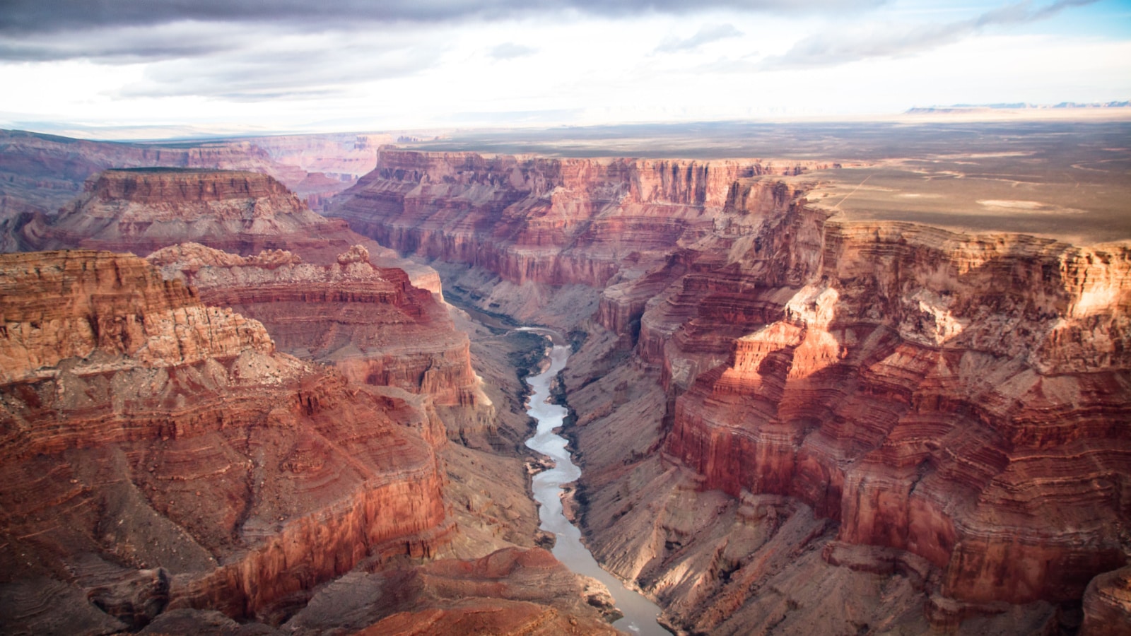 <p>One of the most famous natural wonders in the world, the Grand Canyon is located in northern Arizona. Carved by the Colorado River, the canyon showcases awe-inspiring vistas and vibrant geological layers, drawing millions of visitors each year.</p>