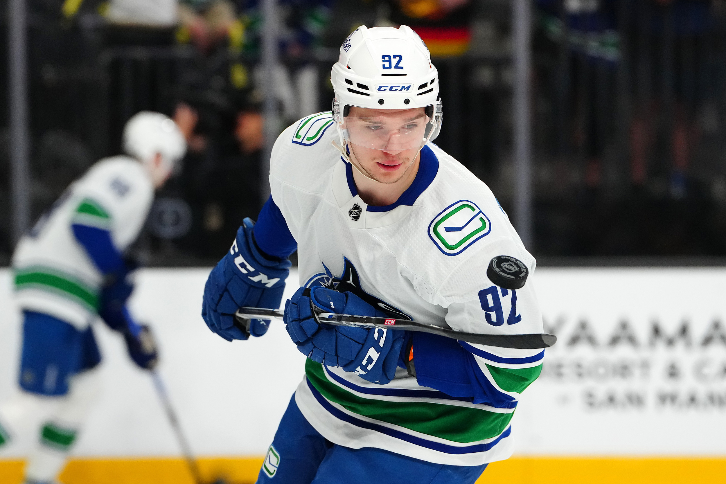 canucks reassign former first-round pick