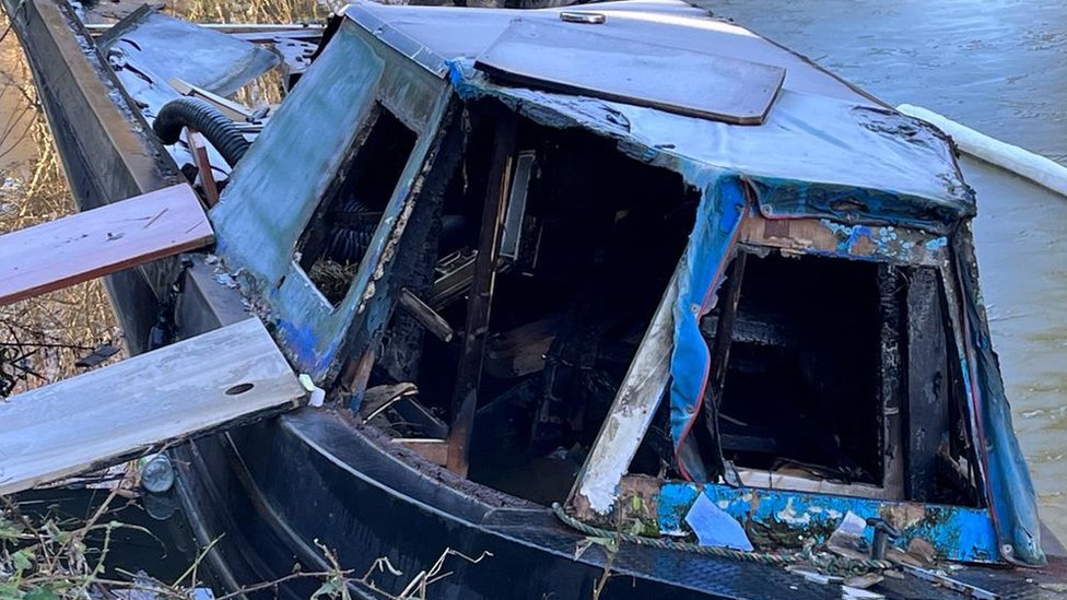 sunken boat still not removed weeks after fire