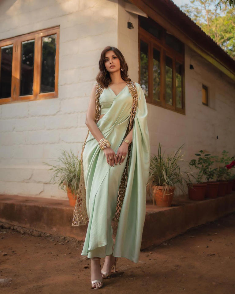Diana Penty in a mint green silk pre-draped saree 
