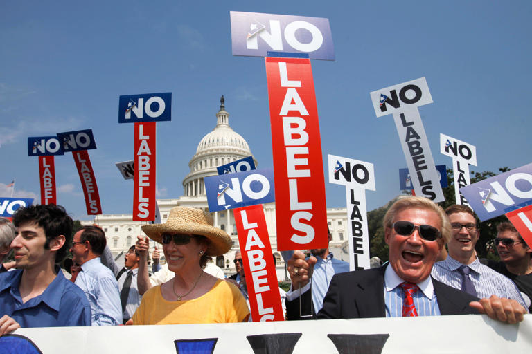 John Holman, of Denver, Colorado, and others with the group "No Labels" take part in a rally on Capitol Hill in Washington, July 18, 2011. Jacquelyn Martin/AP Photo
