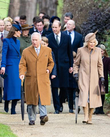 Samir Hussein/WireImage King Charles and Queen Camilla lead the charge during the royal family's walk to church on Christmas at Sandringham in December 2023.