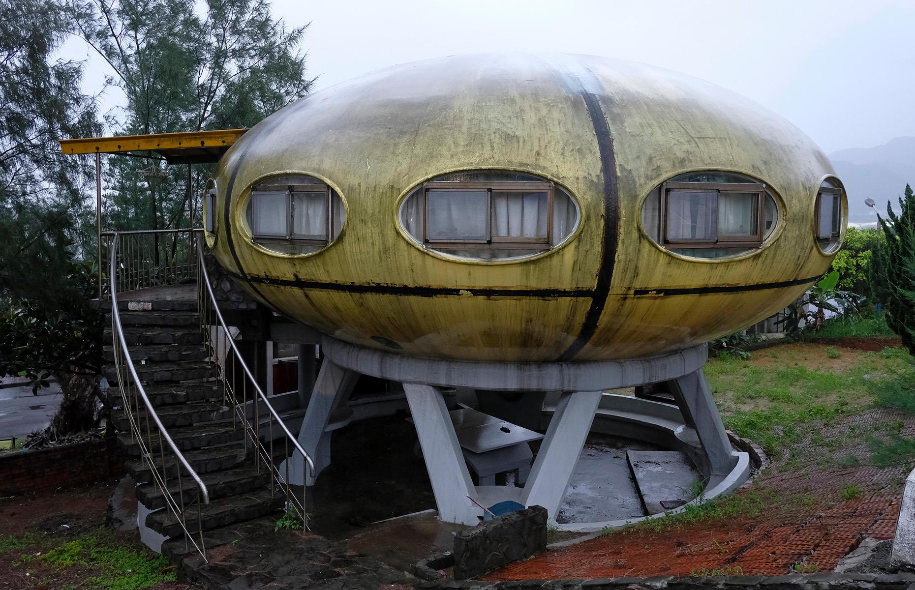 <p>Located on the northern coast of Taiwan, the futuristic resort town featured a complex of bright UFO-shaped homes and a large swimming pool complex. Construction was halted on the site two years after it had begun, with the developers citing financial constraints following investment losses.</p>