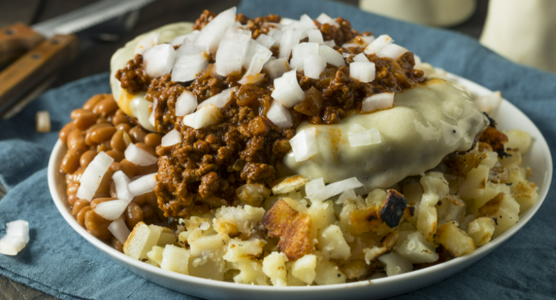 <p>The concept of a “garbage plate” dish typically includes a combination of comfort foods like hot dogs, hamburgers, or other meats, served on a bed of home fries and macaroni salad, and often topped with condiments like mustard, onions, and a special sauce.</p>