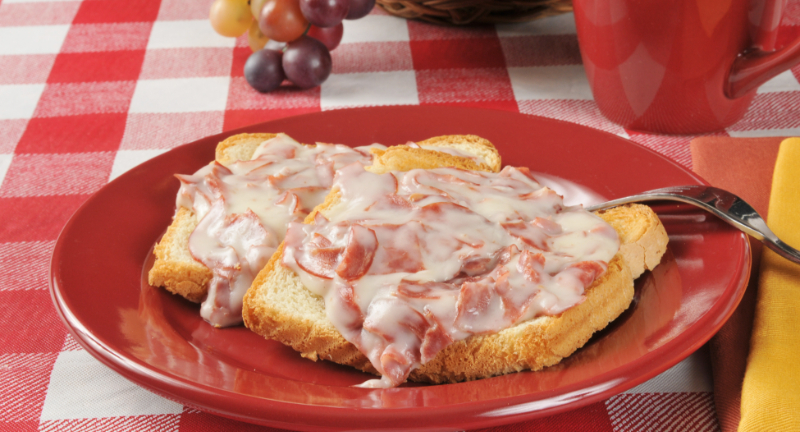 <p>Creamed Chipped Beef on Toast,consisted of dried and salted beef that was chipped or thinly sliced, cooked in a creamy white sauce, and served over toast. This dish was not only affordable but also provided a hearty and filling meal for families facing economic challenges. Creamed Chipped Beef on Toast showcased the ability to create flavorful and satisfying dishes with basic, readily available ingredients during times of financial hardship.</p>