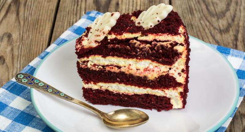 <p>Red Velvet Cake gained popularity during the Great Depression, a time when ingredients like cocoa were considered luxuries due to their high cost. To overcome this, bakers started incorporating beets or red food coloring to enhance the cake’s color and provide a subtle cocoa flavor, offering a visually appealing and cost-effective alternative to traditional chocolate cakes..</p>