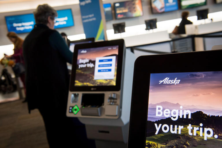 Alaska Air Group Inc. self check-in kiosks at San Francisco International Airport.