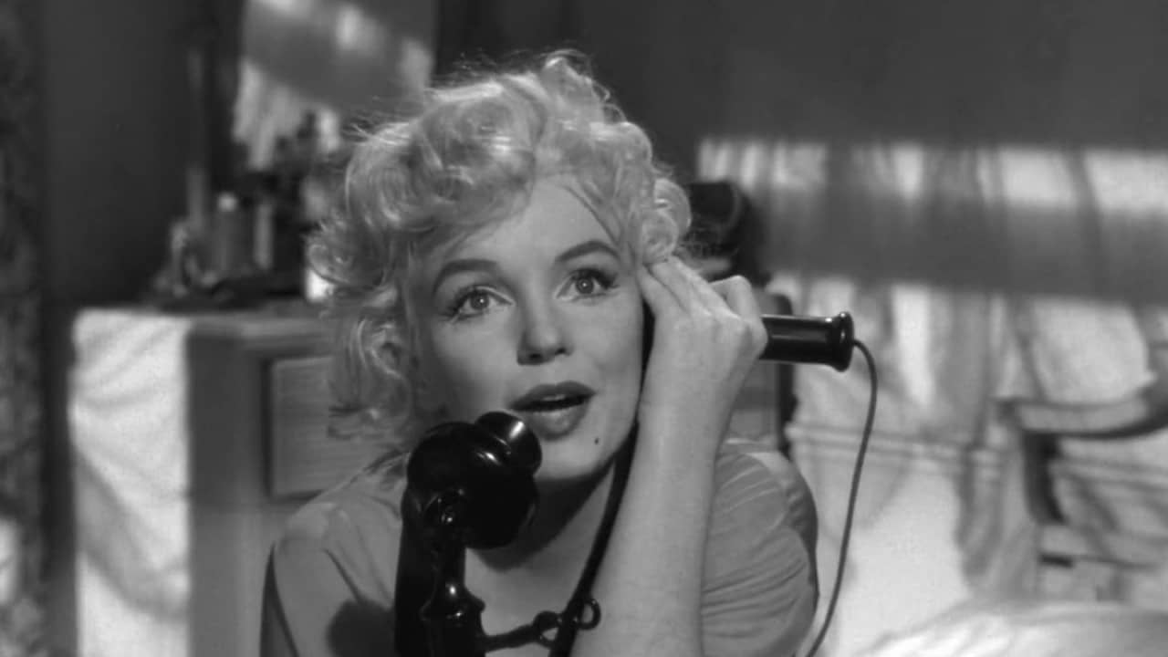<p>Despite her challenging offscreen behavior, Wilder reteamed with Marilyn Monroe in <em>Some Like It Hot</em>, which would become her most famous film. The influential screwball comedy stars Jack Lemon and Tony Curtis as two hapless musicians who, after witnessing a mob hit, disguise themselves as women in a traveling all-girl band. But comedic hi-jinks ensue when they befriend the lustrous Sugar Cane, who sings and plays the ukulele for the band.</p><p><em>When Some Like It Hot</em> opened in 1959, it became a commercial and critical smash that earned six Oscar nominations. The film has since earned with acclaim as one of the greatest screen comedies of all time, launching a subgenre of gender-bending movies that continues today. The movie works mainly due to the strength of its three lead actors, who are in top comedic form. Monroe never looked more alluring on screen, especially when wearing the famous silk dress, which doesn’t leave much to the audience’s imagination.</p>