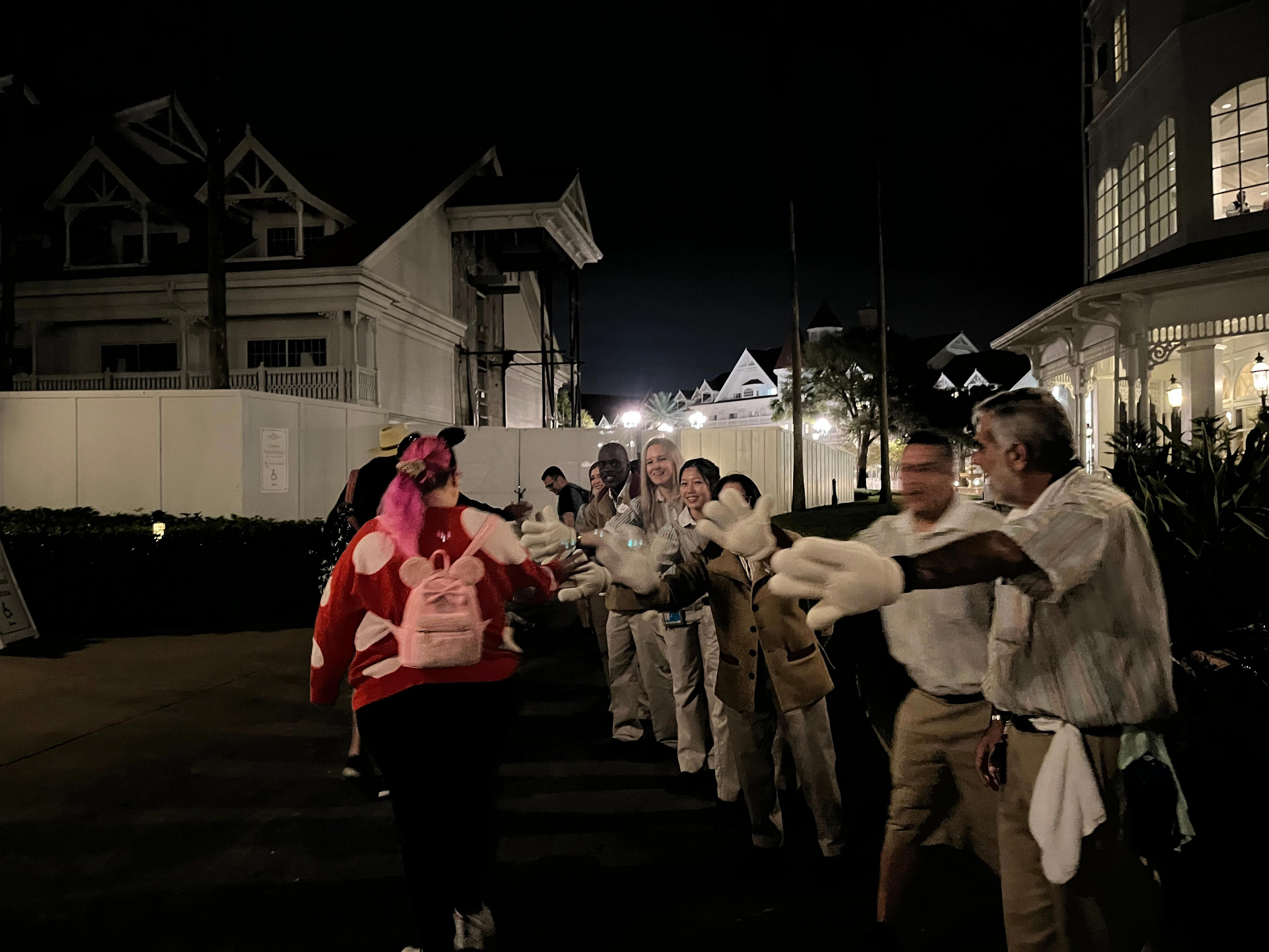 <p>When all of the guests were leaving the area, a group of hotel employees put on Mickey Mouse gloves and encouraged everyone to shake their hands while heading back inside.</p><p>It was such a magical moment that left everyone smiling on their way out.</p>