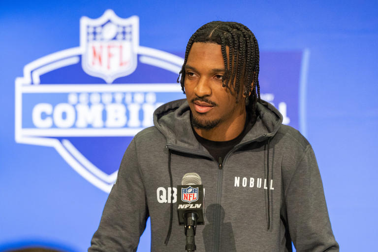 Mar 1, 2024; Indianapolis, IN, USA; Louisiana State quarterback Jayden Daniels (QB01) talks to the media during the 2024 NFL Combine at Lucas Oil Stadium. Mandatory Credit: Trevor Ruszkowski-USA TODAY Sports