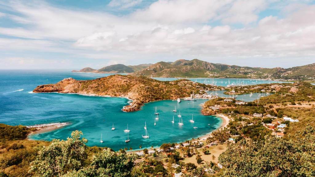 <p>With its 365 powdery white beaches, one for each day of the year, Antigua is a sun-drenched paradise perfect for beach lovers and water sports enthusiasts. This island is a sailor’s paradise with calm waters, steady trade winds, and sheltered harbors.</p><p>Explore Antigua’s colonial past at Nelson’s Dockyard, a UNESCO World Heritage Site and the only working Georgian dockyard in the world. The Dockyard Museum, established in 1855, offers a glimpse of the island’s maritime history. </p><p>For nature lovers, Antigua offers birdwatching, hiking, and eco-tours, which are perfect opportunities to explore the island’s diverse flora and fauna.</p><p class="has-text-align-center has-medium-font-size">Read also: <a href="https://worldwildschooling.com/secret-spots-in-the-caribbean/">Hidden Gems in the Caribbean</a></p>