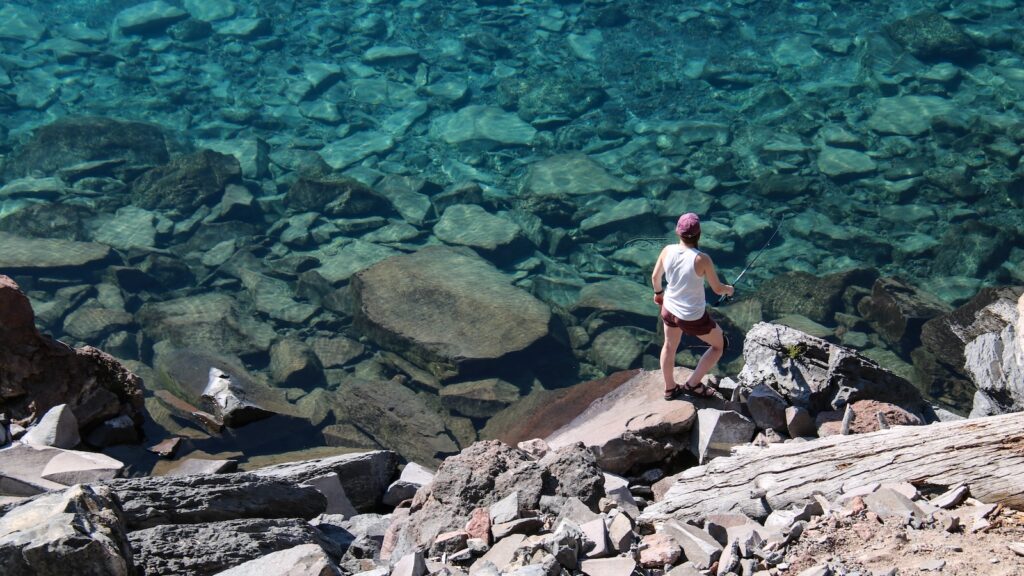 <p>Did you know that despite Crater Lake having no inflow or outflow of water, a large population of kokanee and rainbow trout call the lake home? This is because the lake was stocked with a number of different species of fish back in the late 1800s and early 1900s. </p><p>Today, you can try your luck at catching one of these fish; there are no bag limits, size restrictions, or fishing licenses required! The only place to fish the lake is from the boat dock, as waders and personal floating devices are not allowed.</p>