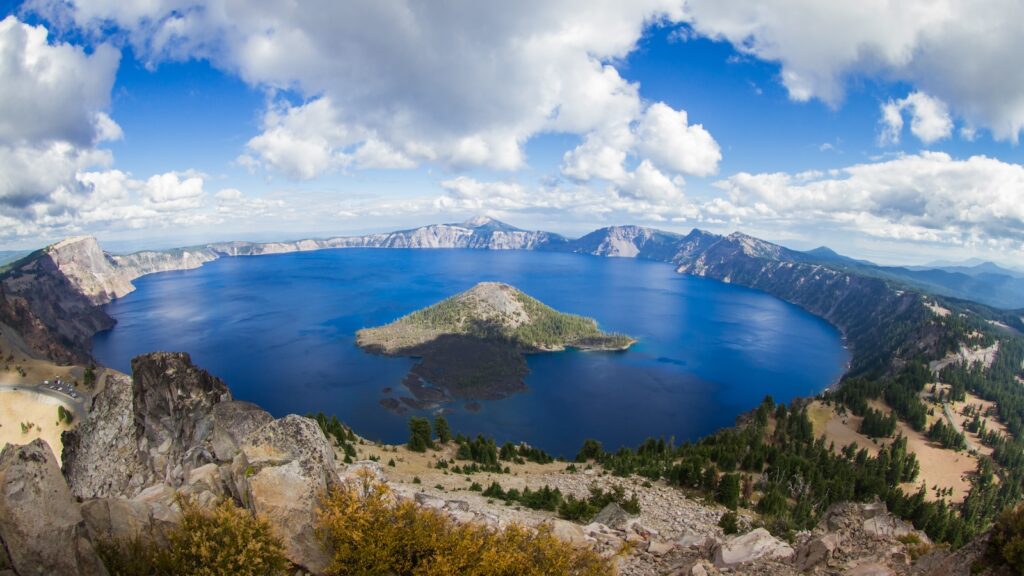 <p>Crater Lake is obviously the main attraction here, with its stunningly blue waters framed by the steep cliffs of this ancient mountain.</p><p>The lake has no inlet or outlet flows, so the only water sources are snow and rain, and the only outlets are evaporation and some seepage into the ground. This means the lake water has virtually no sentiment, leading to its incredible clarity and stunning blue color.</p><p>Did you know that Crater Lake is the ninth deepest lake in the world and the second deepest in North America?</p>