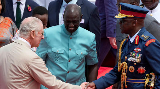 Mr Ogolla with King Charles. Pic: AP