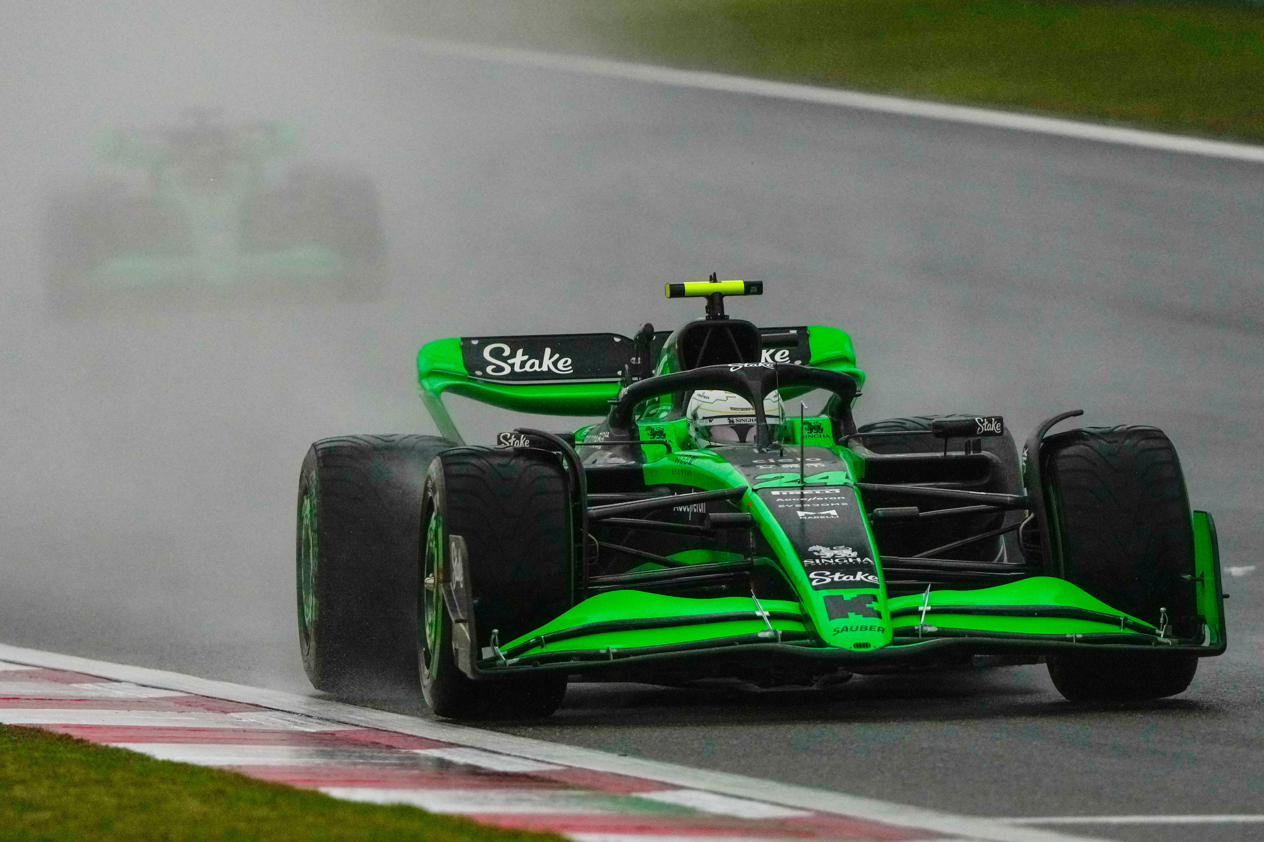 lando norris overcomes rain and fire to take chaotic sprint race pole at chinese grand prix