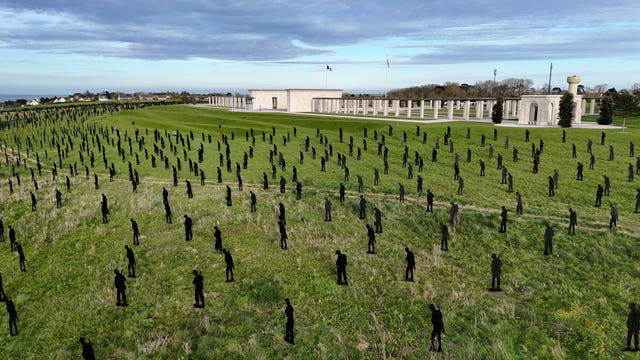 Silhouettes of 1,475 servicemen and two women who died on D-Day installed