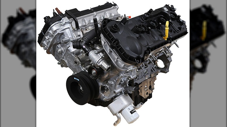 here's why ford's coyote engines look so much bigger than general motors' ls v8s