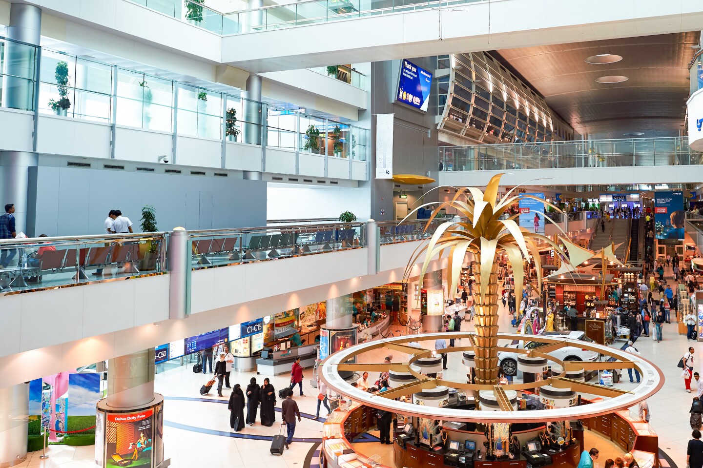 <h2>7. Dubai International Airport, United Arab Emirates</h2> <p>The <a class="Link" href="https://www.afar.com/magazine/the-busiest-airports-in-the-world" rel="noopener">second busiest airport in the world</a> in 2023 with 87 million passengers, <a class="Link" href="https://www.dubaiairports.ae/home-page" rel="noopener">Dubai International Airport</a> isn’t just a massive, bustling hub. It’s also an oasis for shopping, dining, and high-class lounges.</p> <p>Dubai’s airport comprises three terminals. Terminal 3, home to Concourse A, B, and C, is the dedicated terminal for UAE flag carrier Emirates. Terminal 2 is for charter and special-use flights, and Terminal 1 is home to the massive Concourse D, which serves all other global airlines.</p> <p>In Terminal 1, travelers will find nine lounges, including Sky Team, British Airways, and Lufthansa lounges. There is no shortage of dining and shopping options throughout the terminal, including Kitchen by Wolfgang Puck, Shake Shack, and a Hard Rock Café. For passengers flying Emirates, Terminal 3 is home to several Emirates lounges. As for shopping, Dubai Duty Free sells an average of 2.9 million bottles of perfume, 4.5 million pounds of chocolate, and nearly 6,000 pounds of gold every year, to give you a sense of just how much retail therapy happens at this hub.</p>