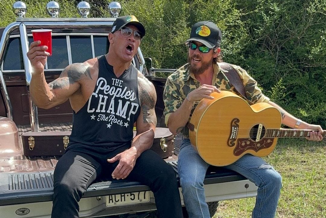 dwayne johnson talks chris janson video collab, says he once wanted to be a country star
