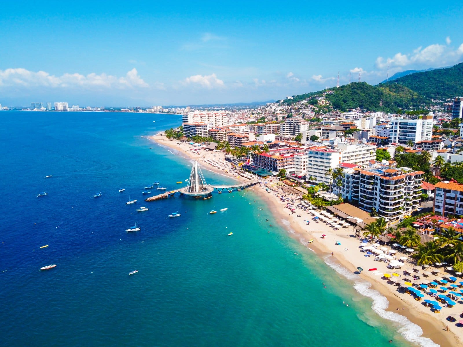 <p class="wp-caption-text">Image Credit: Shutterstock / Hello Cinthia</p>  <p><span>Puerto Vallarta offers sandy beaches and a lively expat community. Beachfront condos are available for $1,500 a month, and RV parks welcome guests at about $600. For a quirky option, stay in a palapa-roofed casita.</span></p>