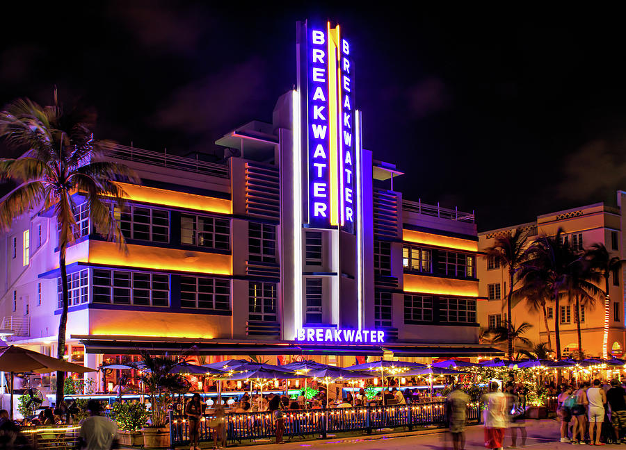 The Breakwater Hotel is a historic Art Deco masterpiece on Ocean Drive, known for its striking blue facade, porthole windows, and neon lights. Built in 1936, it has been featured in numerous films and television shows, cementing its status as an iconic landmark in South Beach.]]>