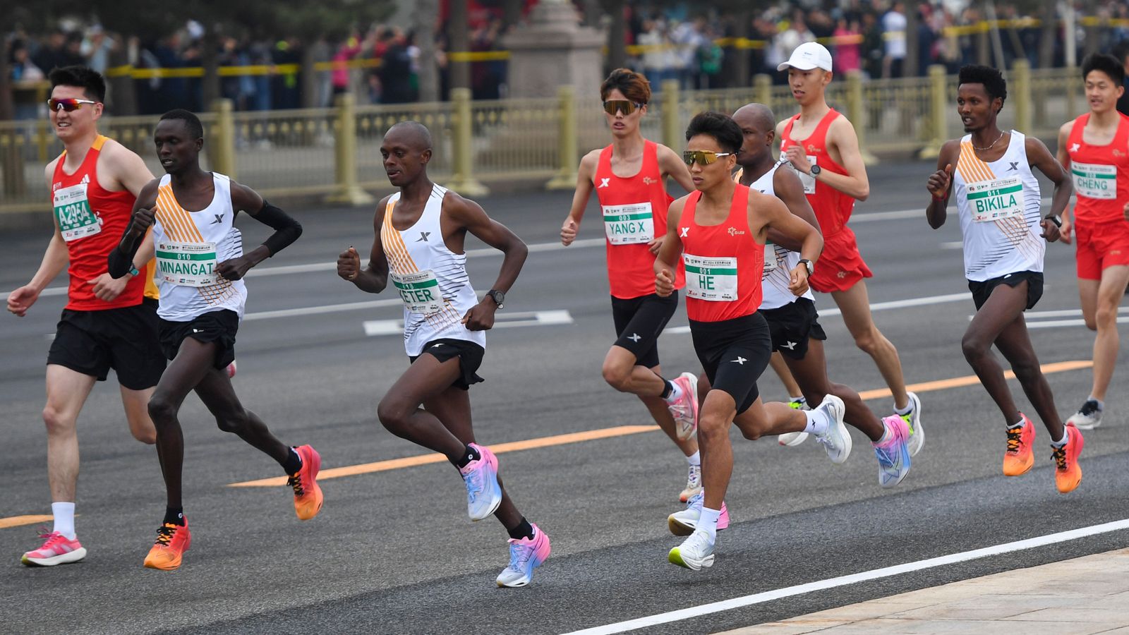 beijing half marathon winner stripped of medal after runners slowed down for him