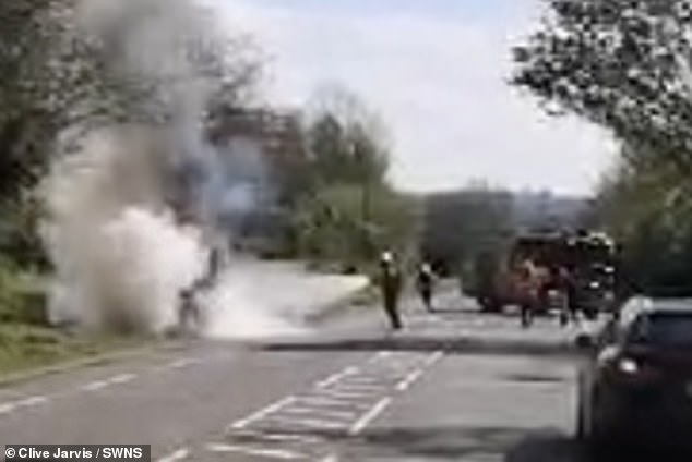 hero, 38, drags elderly couple out of burning car before it exploded