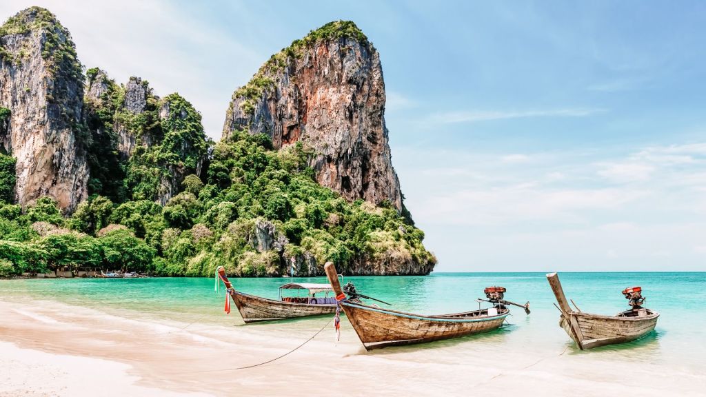 <p>Americans can stay in Thailand without a visa for up to 30 days. You’ll never want to leave once you’ve visited dream-like slices of paradise like Phuket. Phuket is an <a href="https://worldwildschooling.com/paradise-islands/">exotic island</a> with stunning beaches like Hat Bang Thao and tall limestone cliffs. Thailand’s largest island offers the best of both worlds. When you’re not admiring the scenery or floating in the turquoise waters, party the night away in the town.</p><p>During the day, <a href="https://worldwildschooling.com/phuket-with-kids-best-things-to-do-where-to-stay/">Phuket</a> is relaxed, peaceful, and serene. You don’t want to miss attractions like Big Buddha at Nakkerd Hills or Chaithararam Temple (Wat Chalong). However, the island comes to life at night with bright lights, lively street food markets, and nightclubs. The parties get pretty wild at Flame Restaurant & Nightclub.</p><p class="has-text-align-center has-medium-font-size">Read also: <a href="https://worldwildschooling.com/visa-free-asian-destinations/">Visa-Free Countries in Asia</a></p>