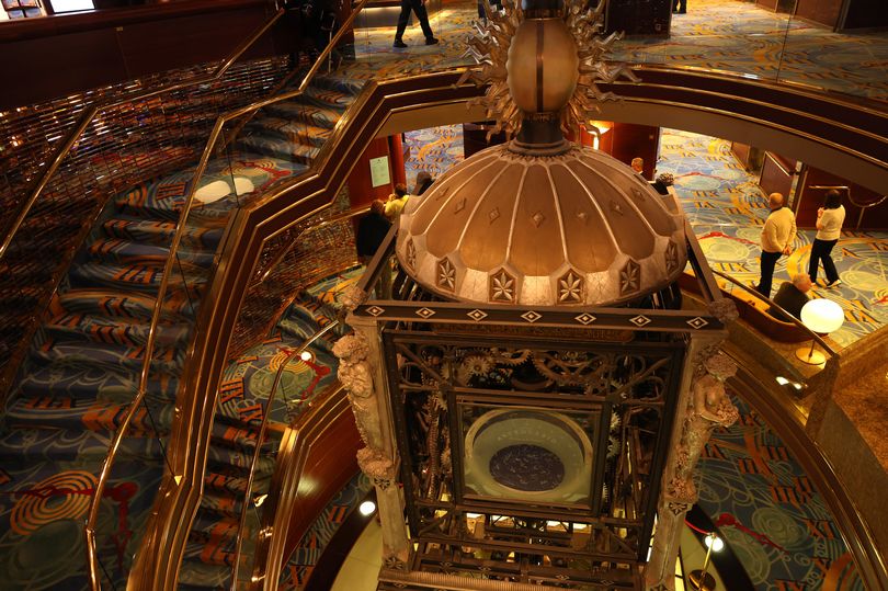 A spiral staircase for guests to navigate the ship