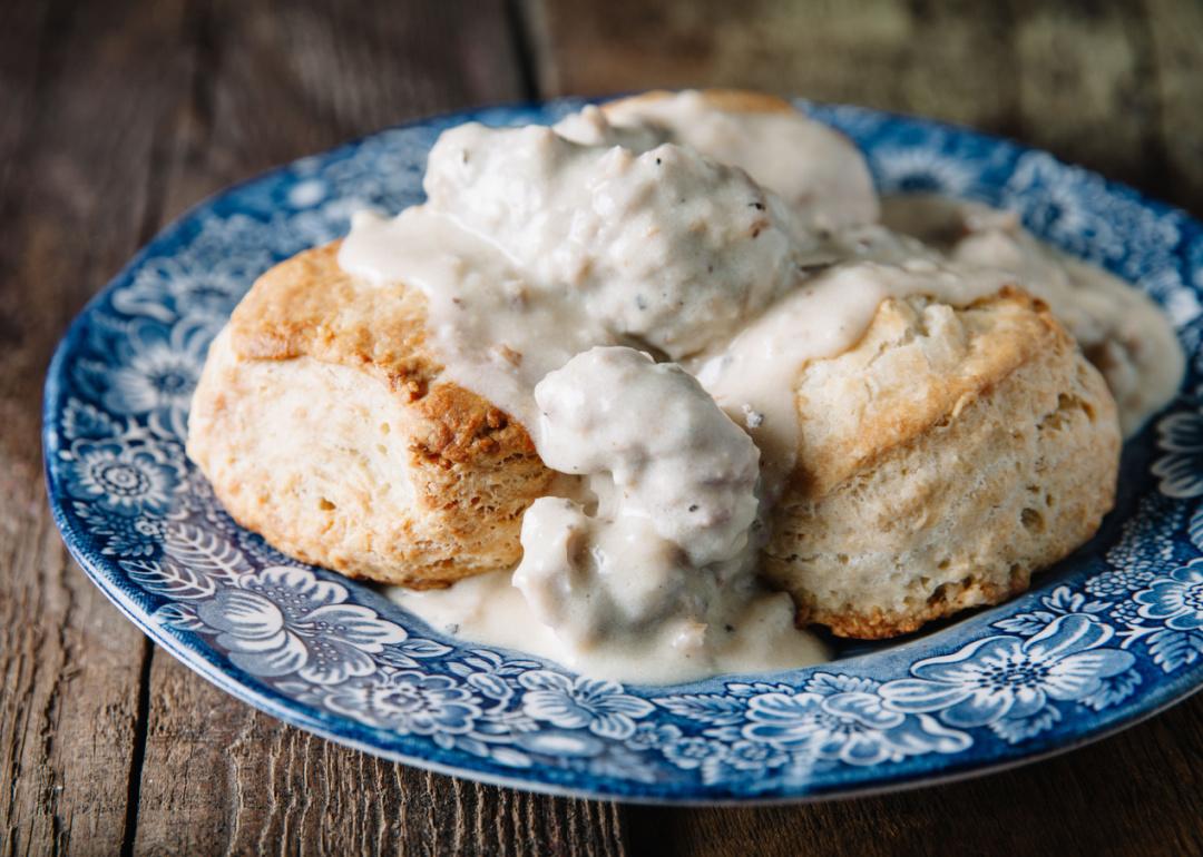 <p>These flaky, buttery biscuits smothered in thick, savory gravy would be an odd dish in any Parisian bistro or Singaporean hawker center. The merging of biscuits with gravy is said to have first occurred in the late 1800s in southern Appalachia. This Southern dish can still be found in diners and eateries nationwide.</p>