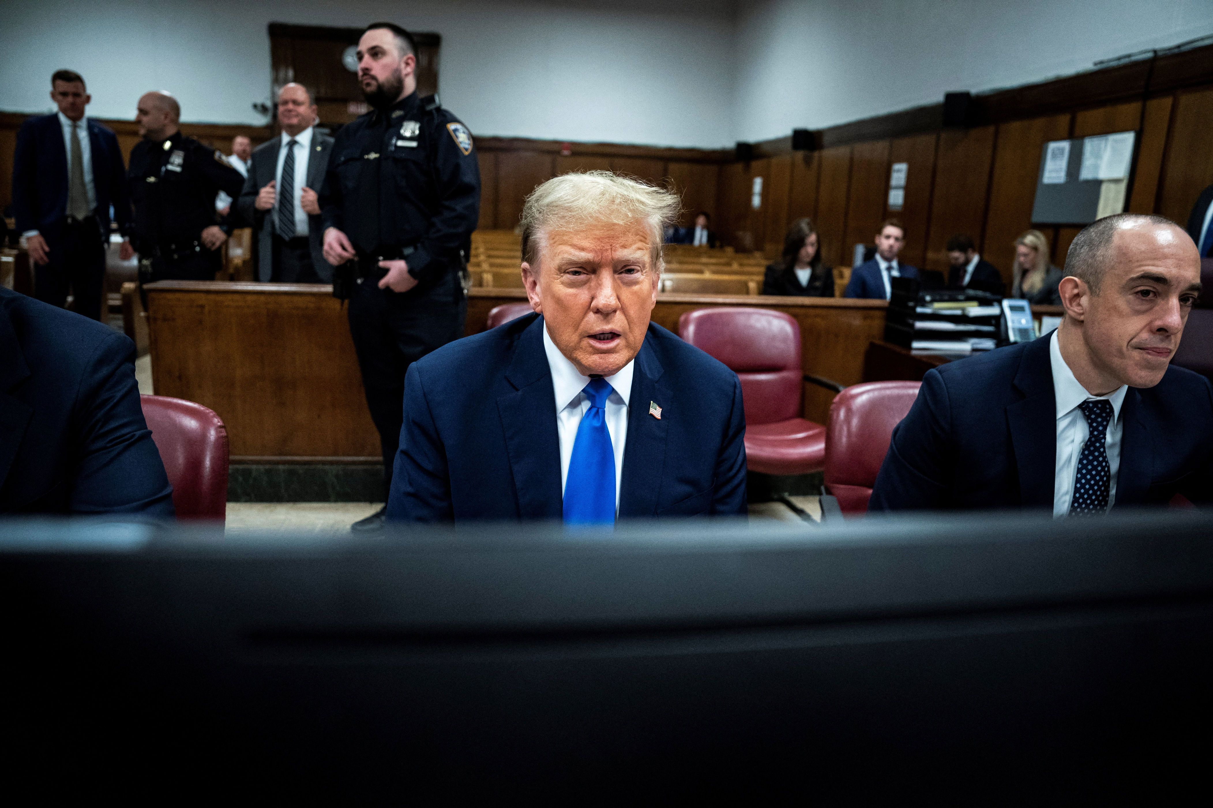 sleeping, smirking and stalking out of court: donald trump’s first week of criminal trial in pictures