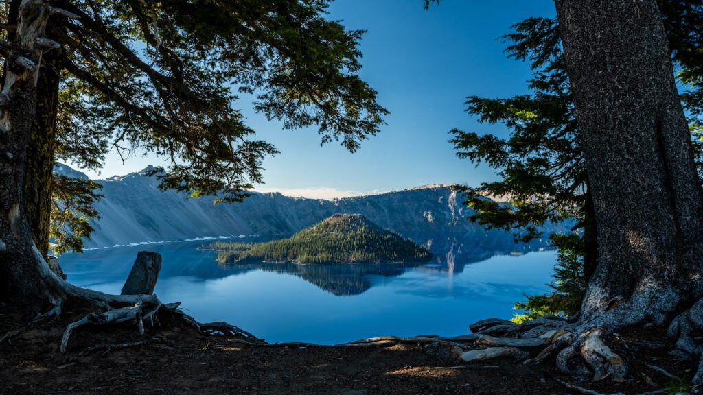<p>Crater Lake is Oregon’s only national park, and it carries that distinction well. This stunningly blue lake is only 7,000 years old and is the result of snowmelt filling the crater left behind when the mountain that previously stood in its place, Mt. Mazama, collapsed during an eruption.</p><p>Hike the 1.1-mile-long trail down to the lake to take a boat tour of the lake or just take a quick dip in its crystal clear waters.</p>