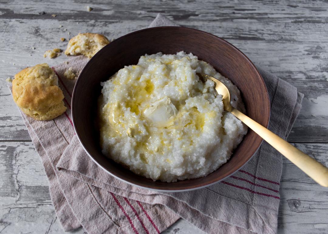 <p>Grits, a type of porridge made from boiled cornmeal, is not something you'd typically see on breakfast tables in any other country. Though similar to polenta, which can be found globally, the food has roots in Native American cuisine (<a href="https://www.npr.org/sections/thesalt/2019/04/18/707689763/saving-the-story-of-grits-a-dish-born-of-poverty-now-on-fine-dining-menus">though it isn't tied</a> to any one culture). Grits have been largely adopted as a staple in the American South.</p>