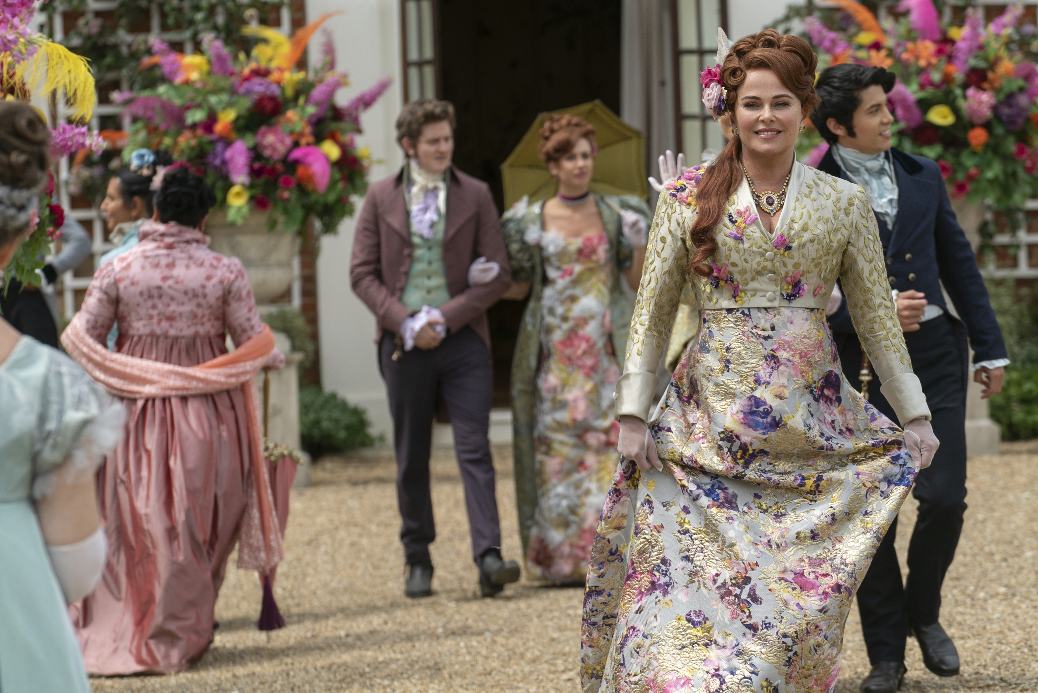 <p>Lorn Macdonald plays Albion Finch, Harriet Cains plays Philipa Featherington, Polly Walker plays Lady Portia Featherington and James Phoon plays Harry Dankworth in episode 1, season 3 of "Bridgerton," which debuts on Netflix on May 16, 2024.</p>