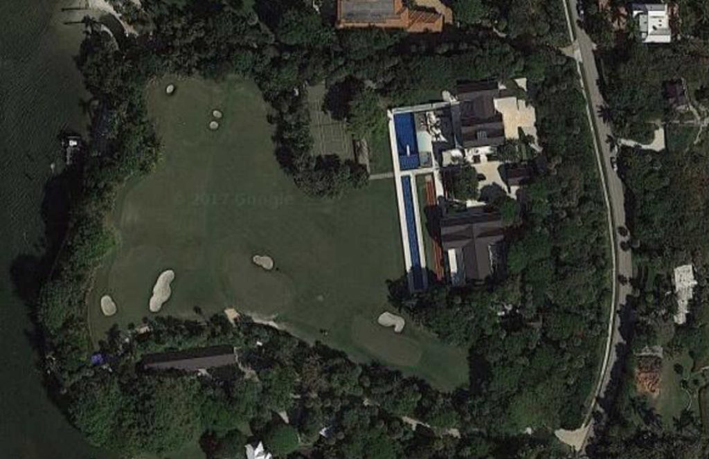 <p>Tiger Woods’ house is located on Jupiter Island in Florida, which is an exclusive community, having reportedly the second highest per-capita income of any inhabited place in the U.S.A. His 12-acre oceanfront property boasts 10,000 square feet of living space. Tiger originally purchased this place in 2006 for $40 million. He then spent another $20 million demolishing it and building his new dream home. </p> <p>The mansion is now reportedly worth $55-60 million. Not much is known about the interior’s amenities, but we can imagine it’s obviously incredible. However, based on what you can see from satellite views, the exterior is ridiculous. It features a 3.5-acre golf course complete with four greens and a short game facility. There is also a tennis/basketball court, and two large pools; a 100-foot lap pool and a 60-foot diving pool. </p>