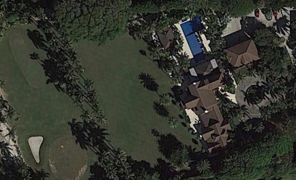 <p>Greg Norman bought this 26,000 square foot Jupiter Island, Florida mansion which is called “Tranquility” back in 1991 for $4.9 million. It is now worth close to $55 million.</p> <p>While most houses are categorized by their number of bedrooms, this property is described as having seven separate buildings. As well as the colonial-style main home, the other buildings include a two-bedroom oceanside guesthouse with a six-car garage and a three-bedroom carriage house with four-car garage. It also features a tennis court, resort style pool area with Polynesian style grill house, a putting green, complete gym, game room, home theater, and beachside activities and boating access.</p>