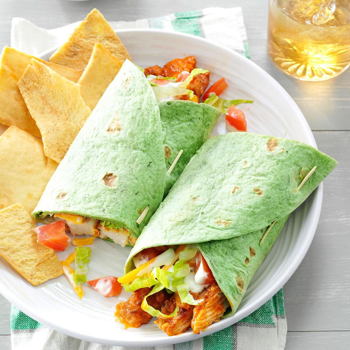 <p><strong>Total Time: </strong>25 minutes<strong> Main Ingredients: </strong>Chicken breast halves, hot pepper sauce, spinach tortillas, blue cheese salad dressing<strong> Level: </strong>Intermediate</p> <div class="listicle-page__buttons"> <div class="listicle-page__cta-button"><a href='https://www.tasteofhome.com/recipes/buffalo-chicken-wraps/'>Go to Recipe</a></div> </div> <p>Spice up your lunch with Buffalo chicken wraps—everything you love about Buffalo wings, in wrap form.</p> <p><em>Blue cheese dressing and hot pepper sauce enhance these yummy tortilla wraps. Filled with chicken, cheese, lettuce and tomatoes, these buffalo chicken wraps are colorful, fun to eat...and tote-able, too! —Recipe contributor Athena Russell, Florence, South Carolina</em></p>