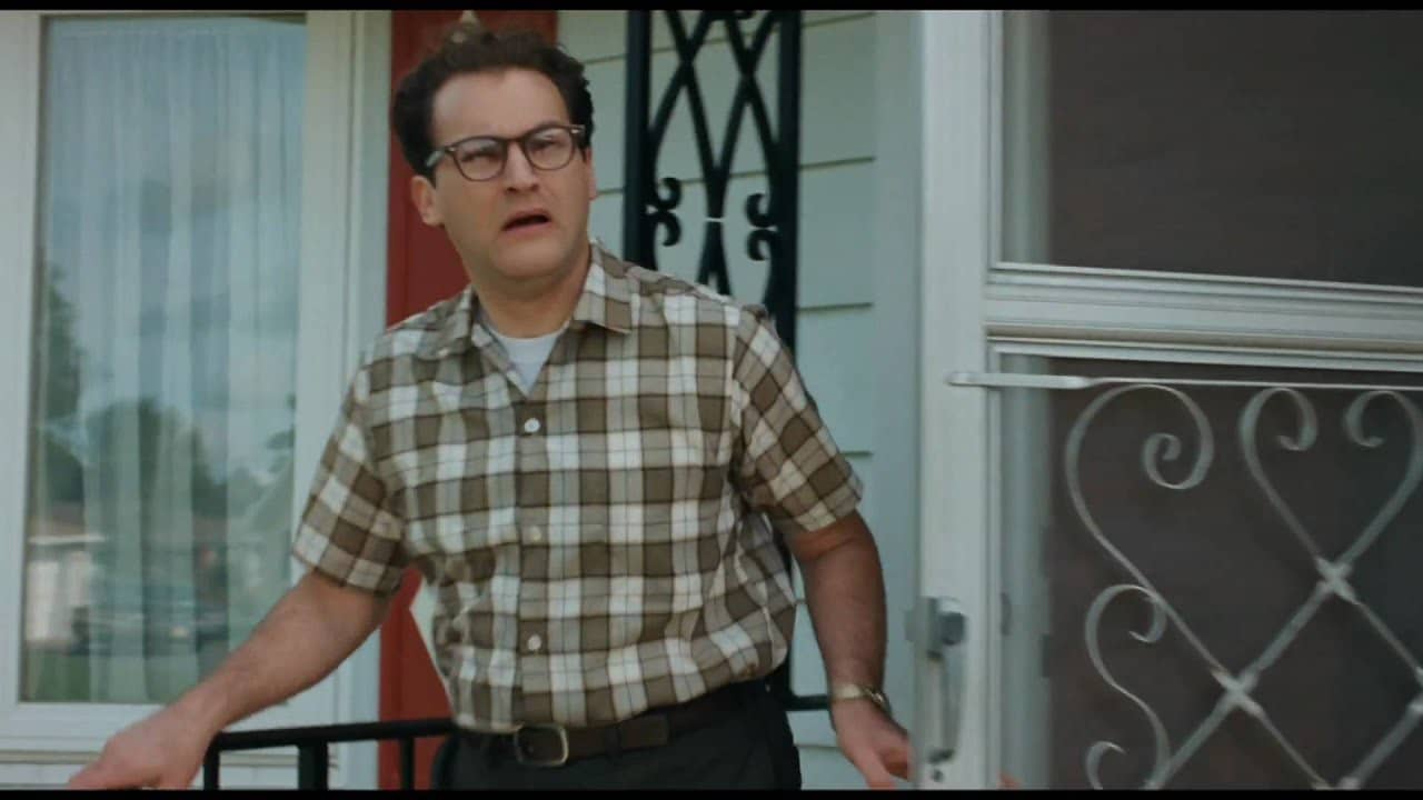 <p>The fabric of the brothers’ traditional Jewish childhood is woven deep into this darkly comic fable. The comedy set-pieces of <i>A Serious Man</i> are so dark and understated that it could only be a Coen Brothers film.</p><p>Drawing upon their upbringing in small-town ‘60s Minnesota, this story is an interpretation of the Biblical story of Job. Job infamously negotiates the death of his children, his livestock, and the affliction of skin sores. Meanwhile, <i>A Serious Man</i> sees protagonist Larry Gopnik, a science teacher at the local community college, tortured by a similar combination. Gopnik suffers alienation from his kids, enforced separation from his wife, and an ambiguously negative trip to his physician. He even makes a cultural faux pas by refusing a bribe from a Korean student’s father, triggering an avalanche of bad luck that culminates in a typically cold Coens ending. Add to this an antisemitic neighbor bent on claiming an evident boundary overshoot with his lawnmower; you have a good sense of the film’s depressing yet brazen schadenfreude.</p>