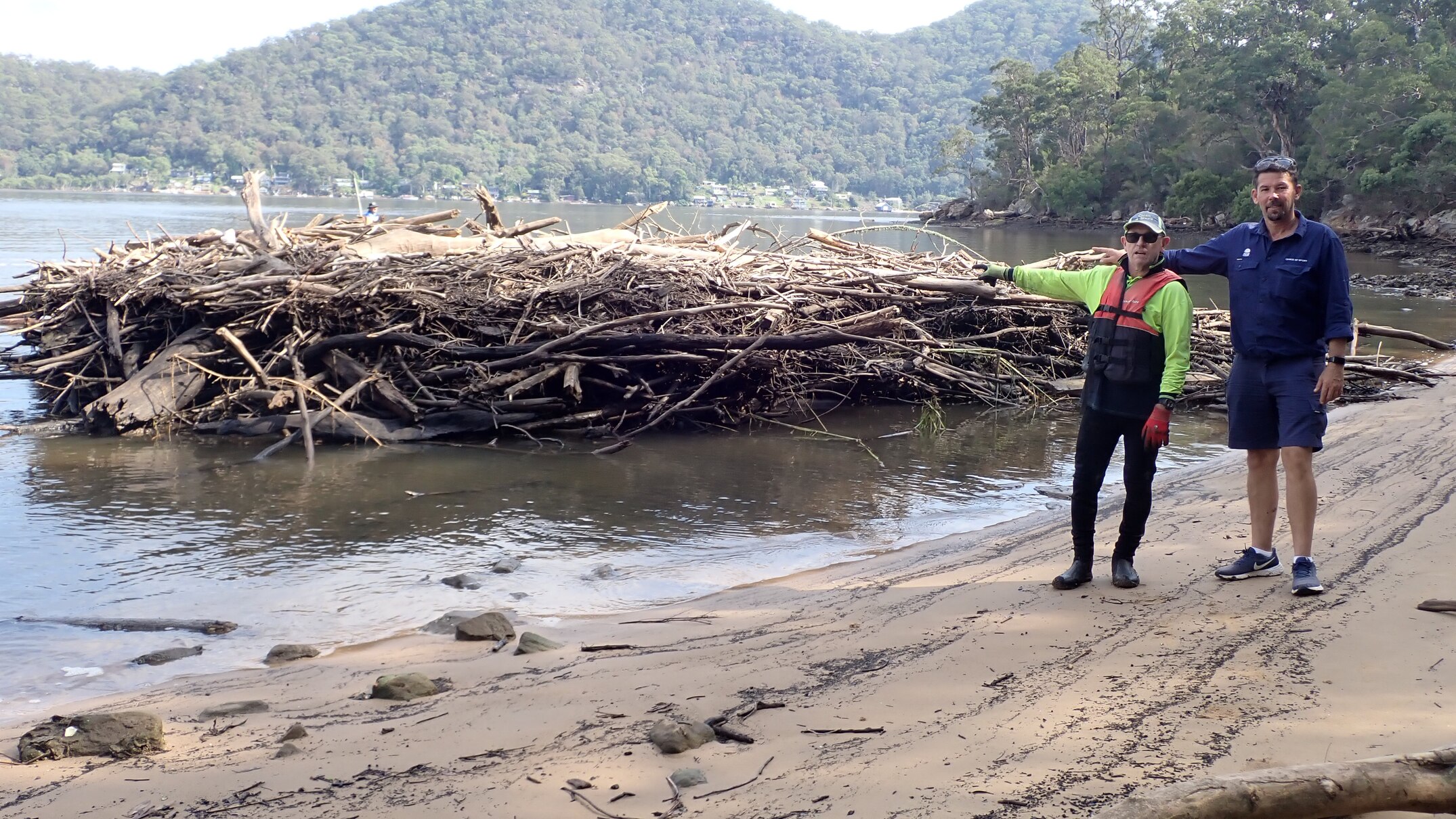 Twenty-metre floating island of debris makes landfall in Sydney's north ...