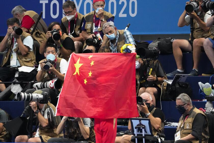 ama confirma que nadadores chinos recibieron permiso para participar en tokio