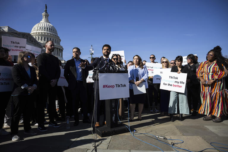 Several members of Congress along with TikTok users hold a press conference opposing an earlier House bill that could ban TikTok, outside the U.S. Capitol on March 12.