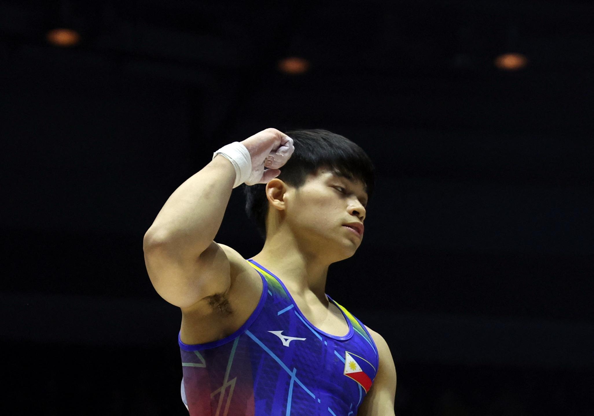 carlos yulo wins world cup series gold in parallel bars