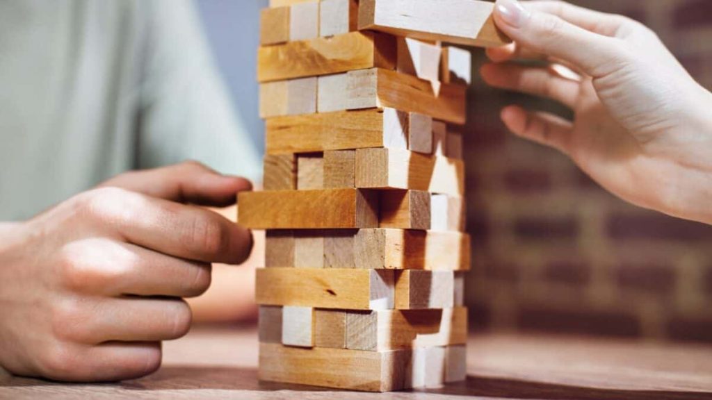<p>The Jenga game consists of several wood blocks of the same size. Kids can cut wood boards using a simple hand saw and a miter box, sand them, and prepare them for the game. They can even paint the blocks and unleash their creativity.</p>