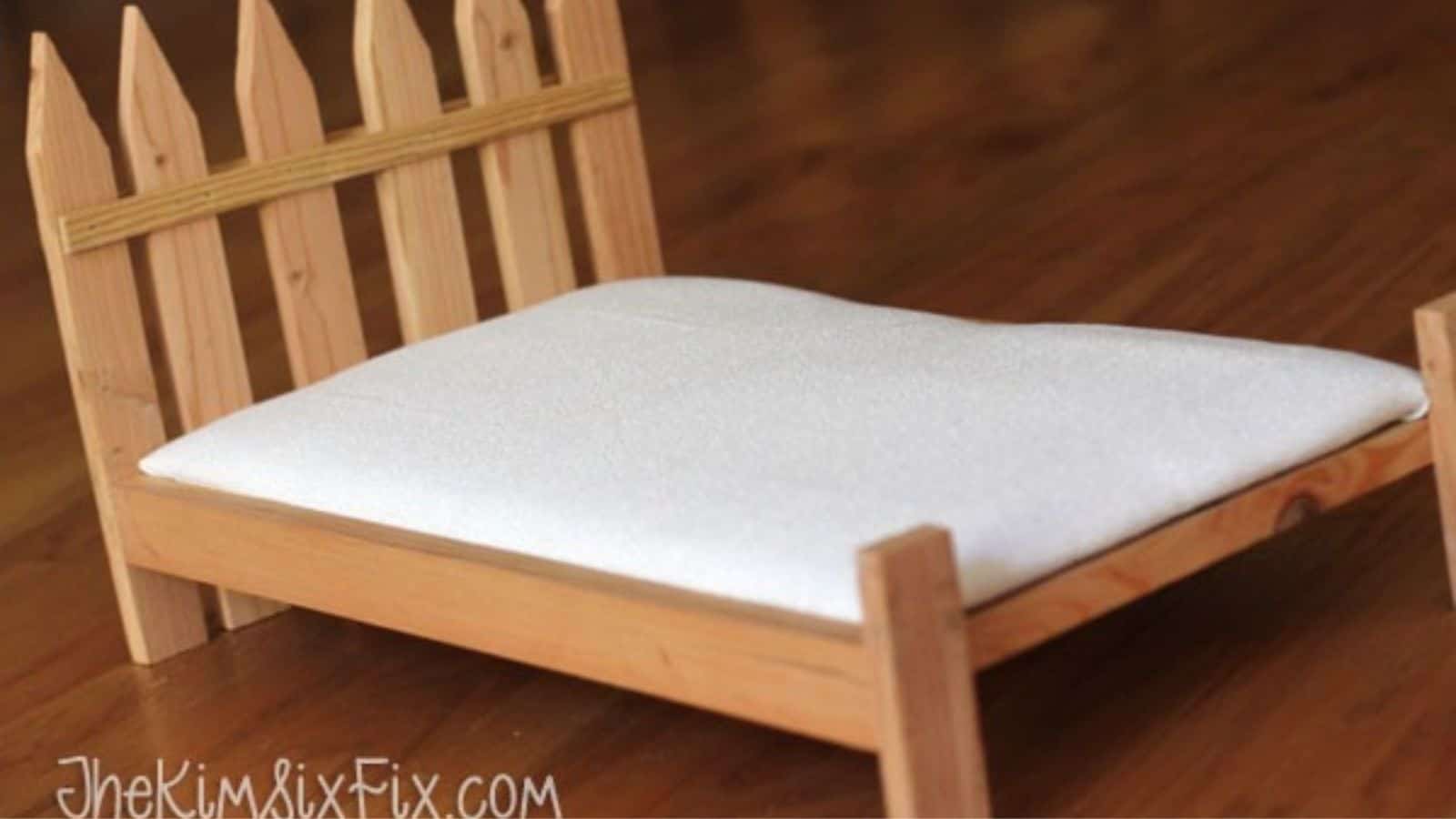<p>Making a doll bed is an easy kid’s woodworking project idea. This one is made from survey stakes and 2X2s. The simple design is perfect for dolls up to 21″. Your kids will appreciate a toy they helped to make. <a href="https://www.thekimsixfix.com/2015/06/easy-diy-picket-fence-doll-bed.html" rel="noreferrer noopener">See how to make this doll bed.</a></p>