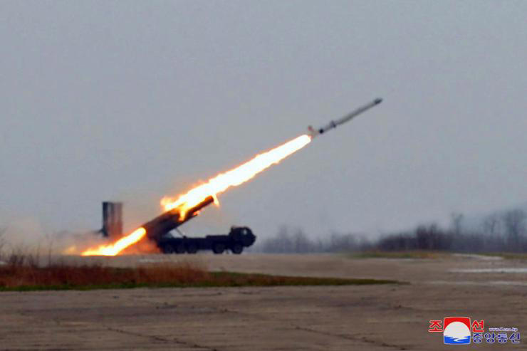 North Korea conducts a test for a 'super-large' cruise missile warhead and a new anti-aircraft missile near the West Sea, Friday, in this photo released by the Korean Central News Agency, Saturday. Yonhap