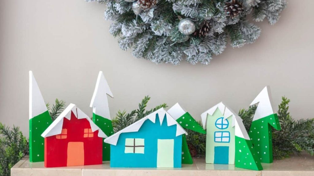 <p>A Christmas village is a festive DIY project for the whole family. Made from scrap wood, it only needs glue and paint to be customized with your kiddos. It will be everyone’s favorite Christmas decoration for years to come. <a href="https://www.anikasdiylife.com/category/woodworking/scrap-wood-projects/">See how to make it here.</a></p>